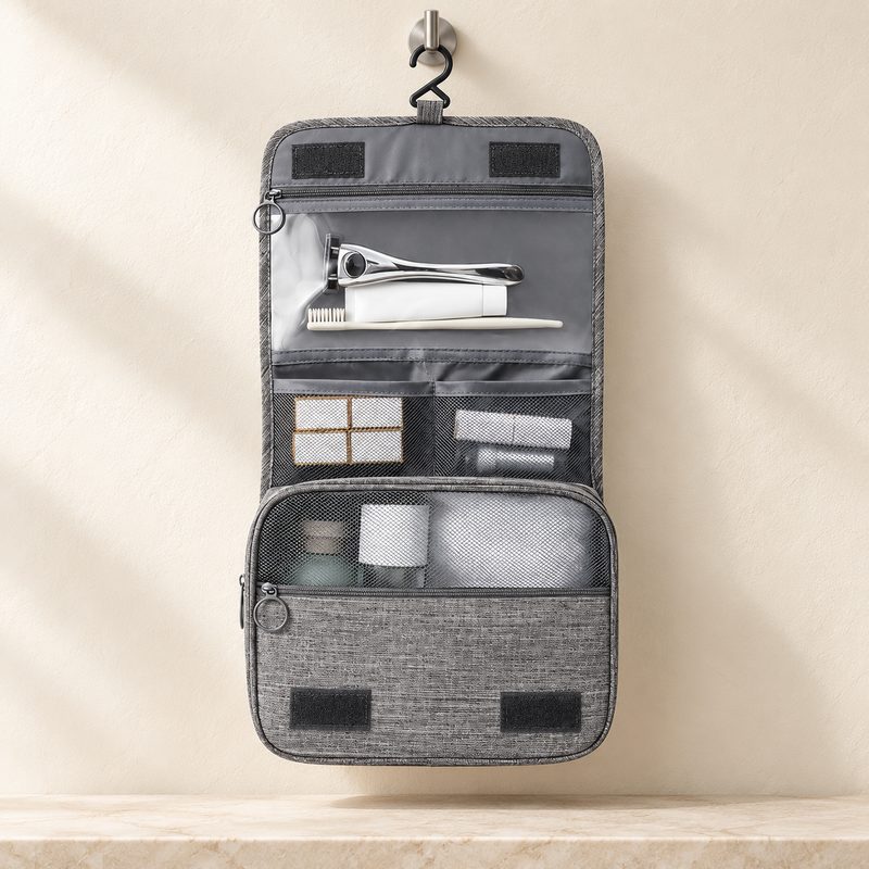 Gray Torvato Haven hanging travel toiletry bag with clear upper pocket, two mesh slip pockets and main zip compartment; toiletries not included
