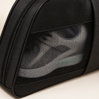 Close-up of breathable side mesh on the Torvato travel shoe bag